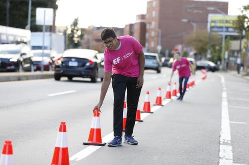 Glocal Challenge winner installing the bus priority lane on PARKing Day 2018
