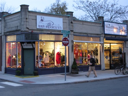 Retail stores along Massachusetts Avenue at dusk