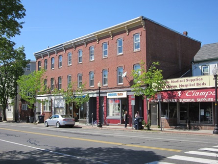 Commerical building with upstairs apartments from Cambridge Street