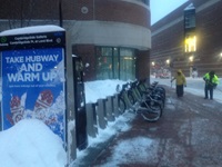 an image of a Hubway station in winter