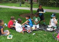 kids having lunch in park
