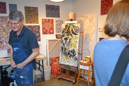 An artist and their studio on display during Cambridge Open Studios.