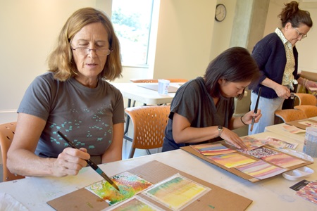 Participants in a free watercolor workshop led by Diane Charyk Norris at Lesley University's Lunder Art Center during the 2018 Cambridge Arts Open Studios.