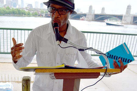 Jean Dany Joachim reads under the Poetry Tent at the 2018 River Festival.