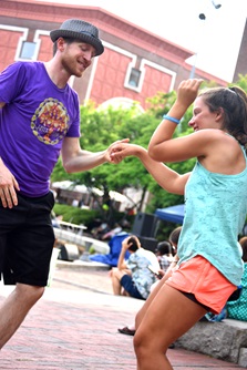 People dance to the music of Julie Rhodes at the 2018 River Festival.