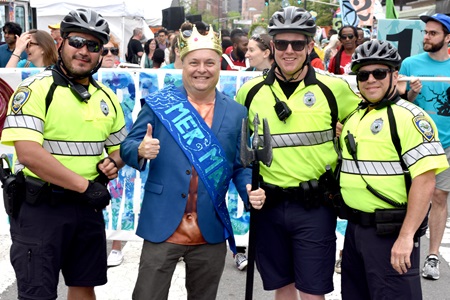 Cambridge Mayor Marc McGovern is the Mer-Mayor at the front of the Mermaid Promenade at the 2019 Cambridge Arts River Festival.