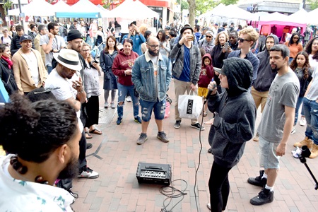 The Bridgeside Cypher hip hop collective performs at Graffiti Alley during the 2019 Cambridge Arts River Festival.
