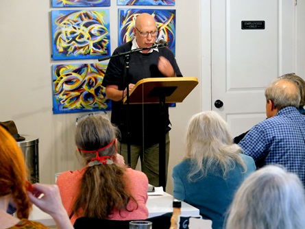 Philip Hasouris speaks at the  City Night Readings Series at The Little Crêpe Café in Cambridge, May 6, 2022.