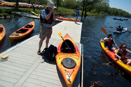 Richard Hackel gets ready to depart from the Charles River dock near the western end of the Cambridge shore.