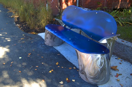 A bench from Bland Hoke's “Artesian Well – A Portal to Sacramento Park’s Past