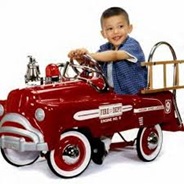 boy on fire truck