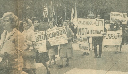 Black and white news photograph of protestors marching against the Inner Belt highway in Cambridge, 1966, published in the Record American newspaper