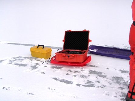 Staff carried the multiprobe case and water pump out to the sampling sites on sleds.