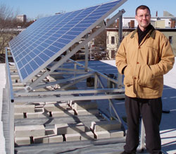 Paul Lyle on Frazier Building roof with PV panels