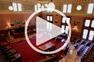 Play button superimposed over photograph of the Sullivan Chamber
