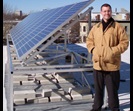 Paul Lyle on Frazier Building roof with PV panels