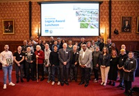 Image of the 18 Legacy Award winners with city staff and officals