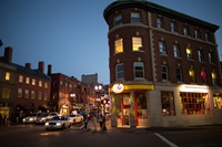 Nightime in Harvard Square, intersection of JFK and Brattle Streets