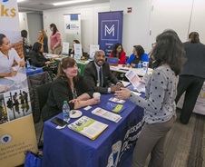 This is an image of people receiving assistance at the Small Business Summit in 2018