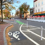 Photo of a new separated bike lane on Mass Ave between Plympton Street and Bow Street