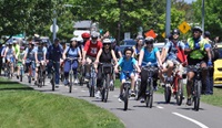 Group riding bikes on Cambridge Bow Tie Ride.