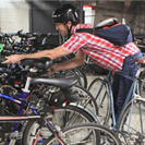 Man parking a bicycle