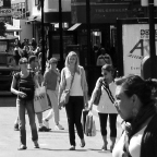 Photo of people walking on a Cambridge sidewalk
