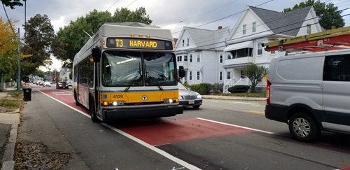 An image showing a bus pulling out of a bus priority bus- and bike-only lane. (From October 2018)