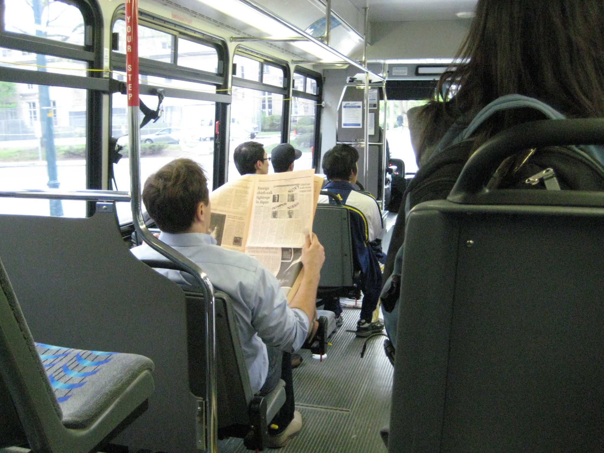 Passengers sitting on an EZRide shuttle bus