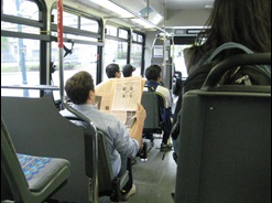 Passengers sitting on an EZRide shuttle bus