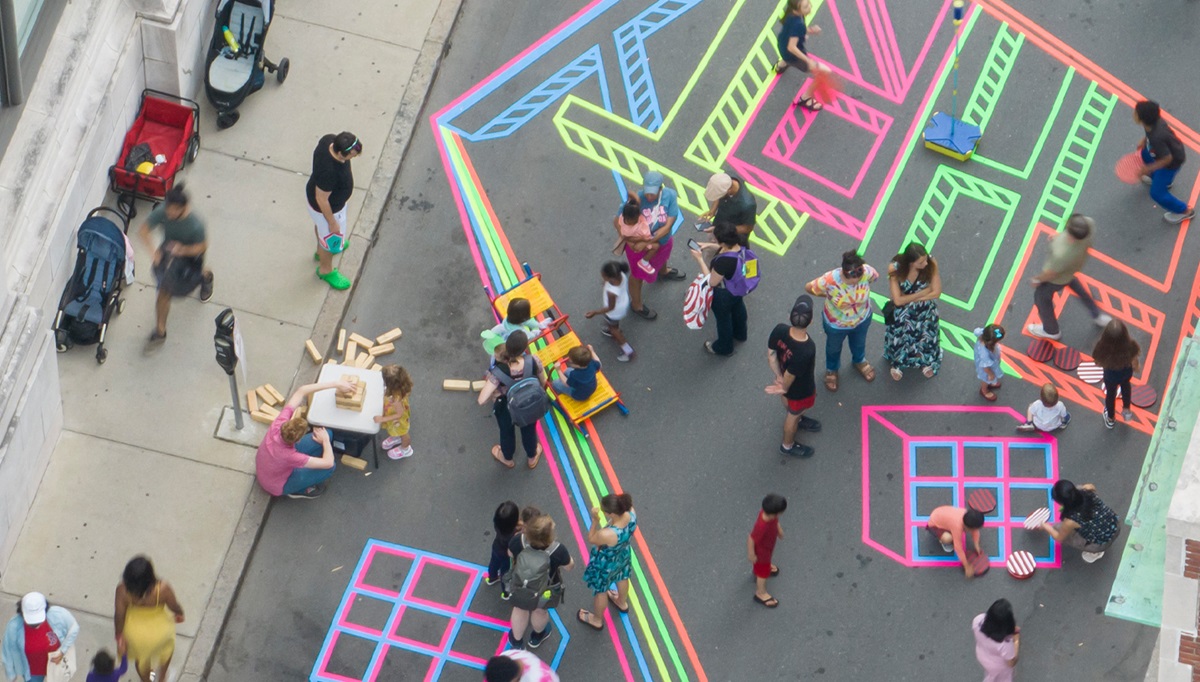 People using the play street viewed from overhead