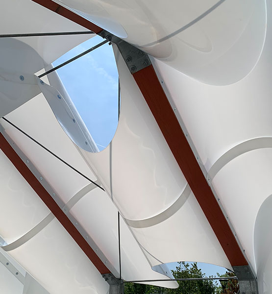 A pop-up shade structure viewed from inside looking up