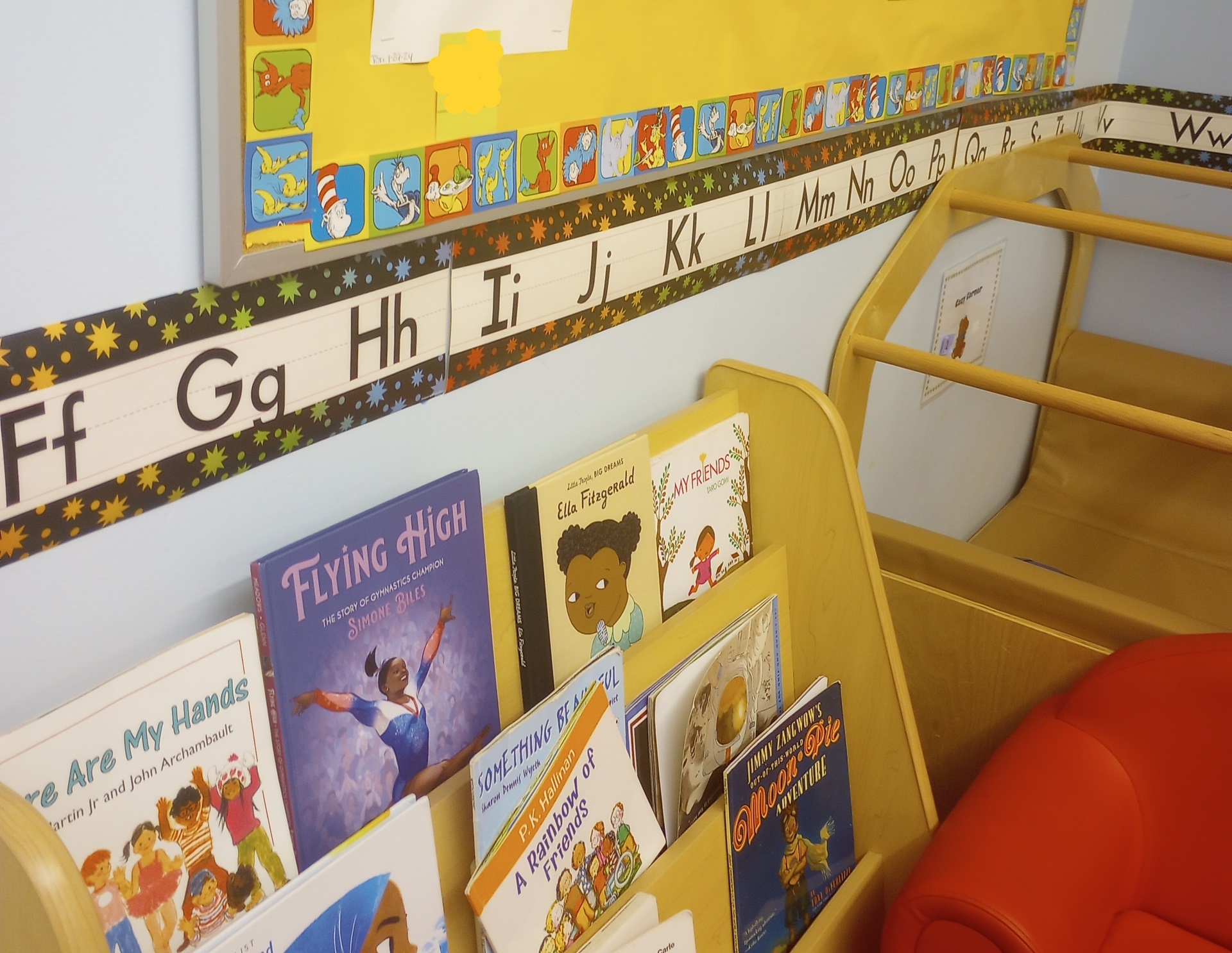 preschool classroom showing alphabet letters and children's books
