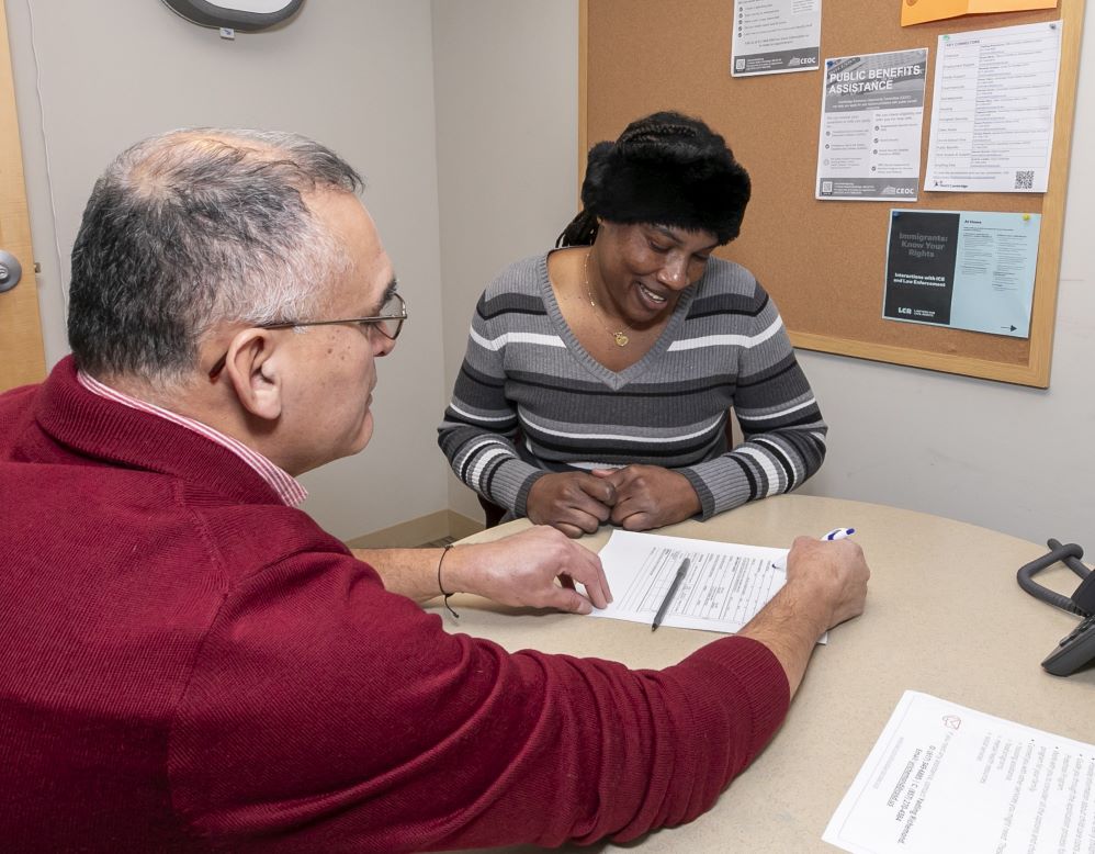 teacher and student filling out application