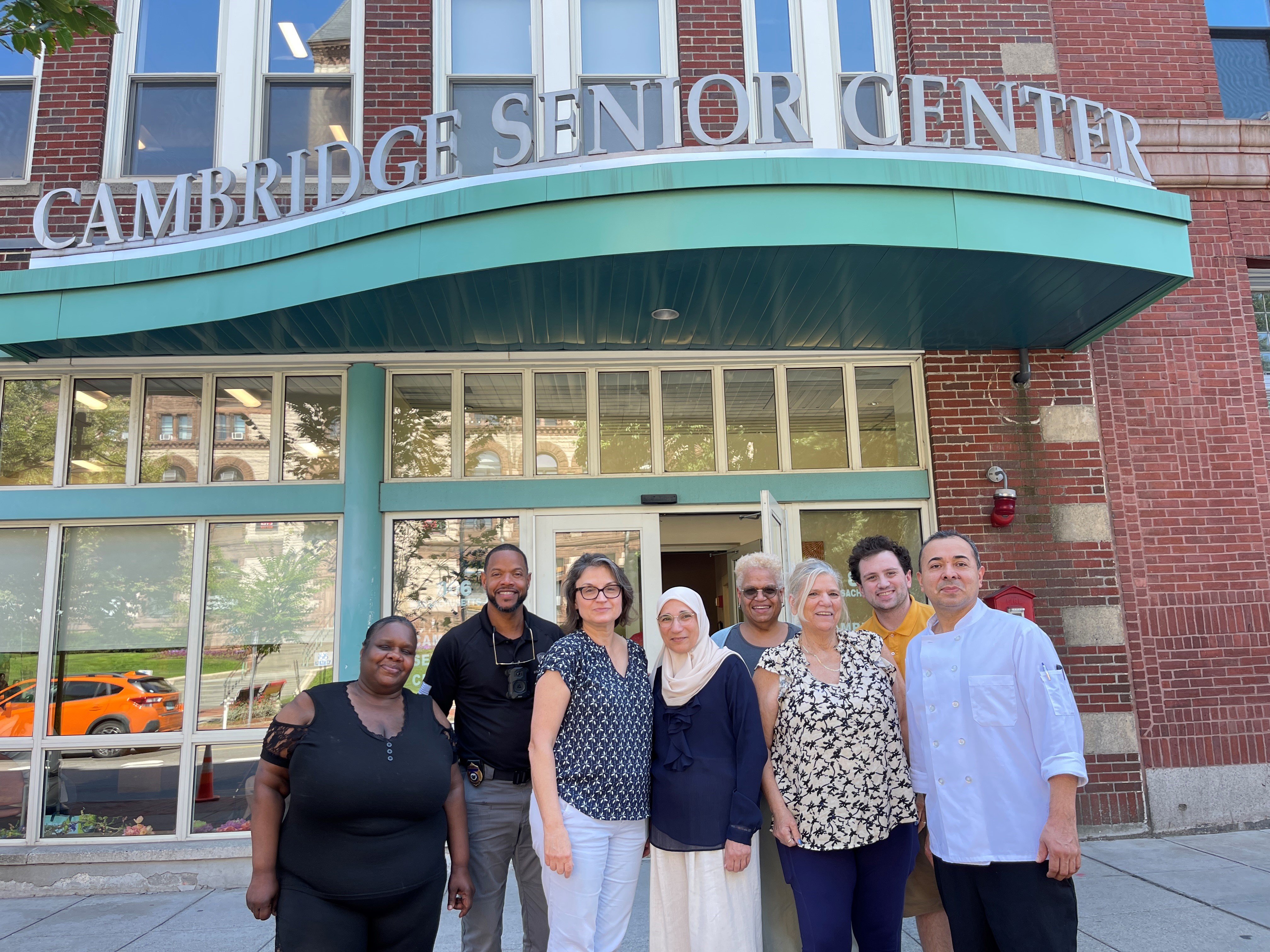 Council on Aging staff members outside of the Cambridge Senior Center, 806 Massachusetts Ave.