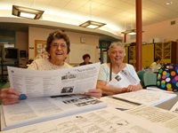 Seniors reading newsline