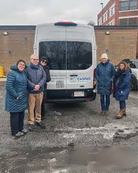Bay Cove Human Services and Cambridge Health Alliance outside the Medical Street Outreach project’s mobile van.