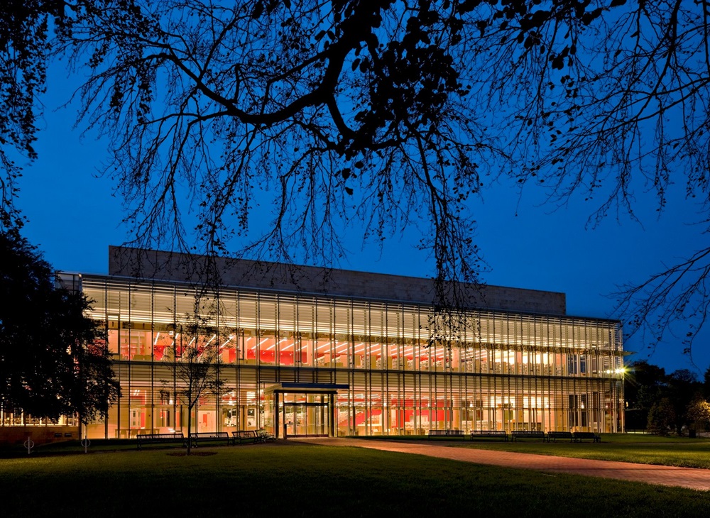 Cambridge Main Public Library at night.