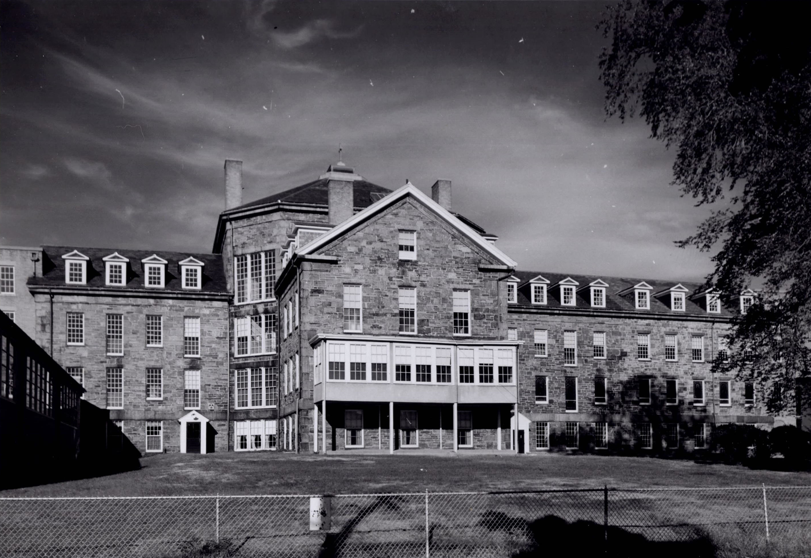The Almshouse building (CA 1965) still stands at 45 Matignon Avenue and has been home to the International School of Boston since 2005.
