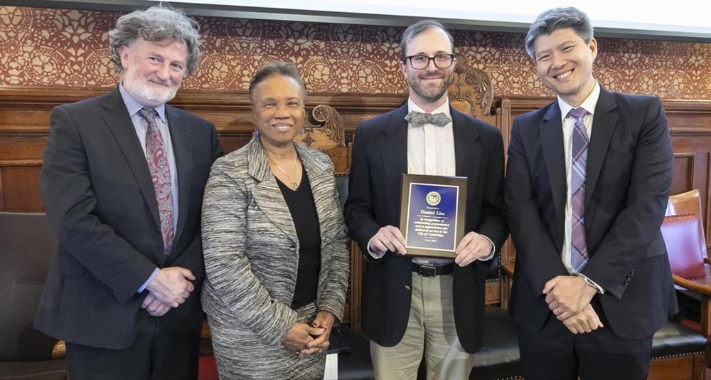 Daniel Liss posing with former Deputy City Manager Owen O’Riordan, Mayor E. Denise Simmons, and City Manager Yi-An Huang (left-to-right) at the 2024 Employee Awards in Cambridge City Hall.