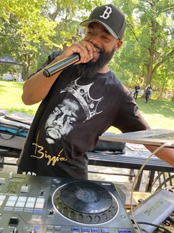 Motivate Merren djs at Clement Morgan Park during the 2026 Cambridge Porchfest.