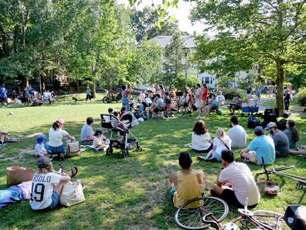 Brookline Buddies community band performs at Dana Park during the 2026 Cambridge Porchfest.