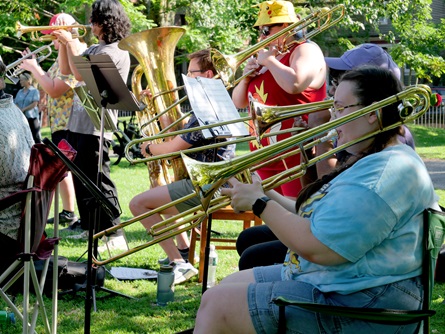 Brookline Buddies community band performs at Dana Park during the 2026 Cambridge Porchfest.