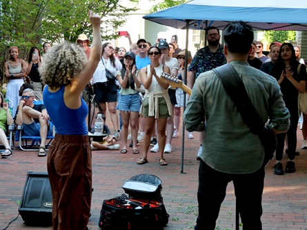 Electric Oaks perform on Auburn Street during the 2026 Cambridge Porchfest.