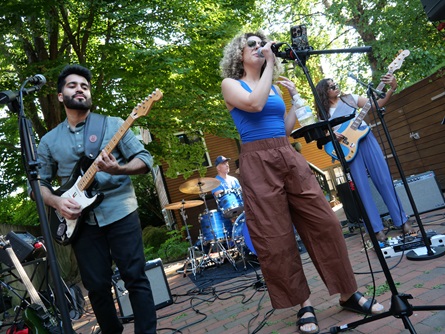 Electric Oaks perform on Auburn Street during the 2026 Cambridge Porchfest.