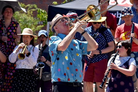School of Honk performs in Central Square during the 2026 Cambridge Porchfest.