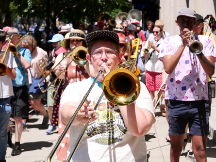 School of Honk performs in Central Square during the 2026 Cambridge Porchfest.