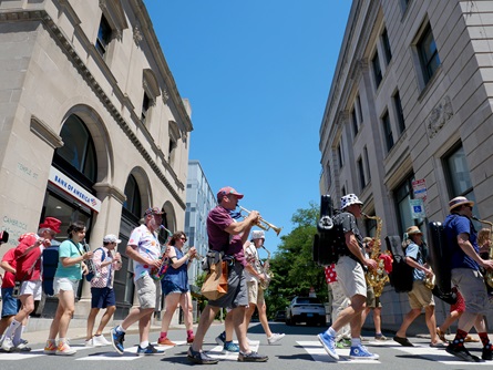 School of Honk performs in Central Square during the 2026 Cambridge Porchfest.
