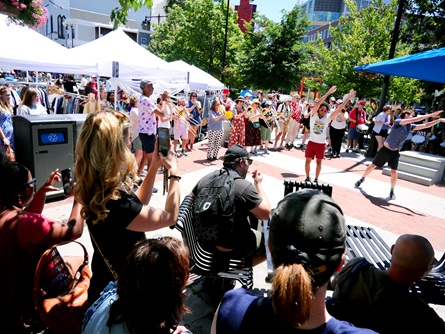 School of Honk performs in Central Square during the 2026 Cambridge Porchfest.