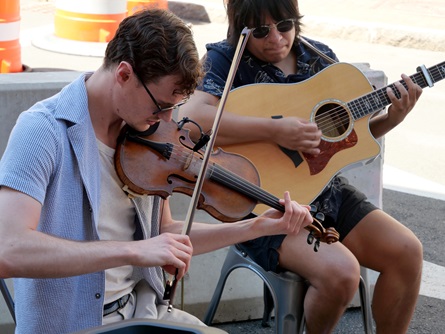 Sean Diehl (left) and Noah Kelly perform at the Sea Hag restaurant and bar during the 2026 Cambridge Porchfest.
